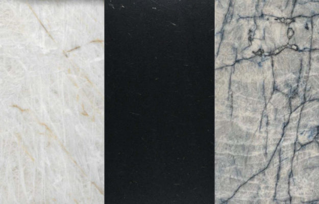 Zwei Weiße und ein schwarzes Granitarbeitsplatten Muster